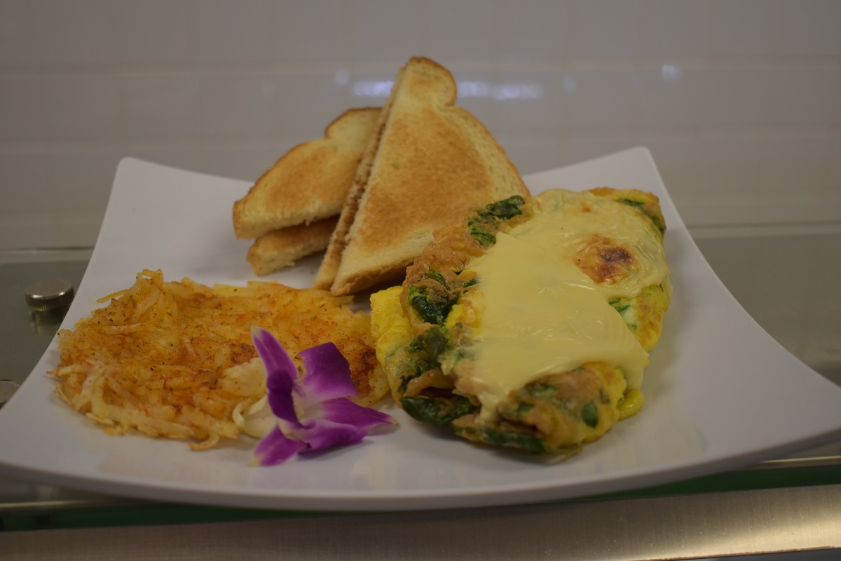 Spinach Omelet By Chef Manny Served with Toast and Hash Browns
